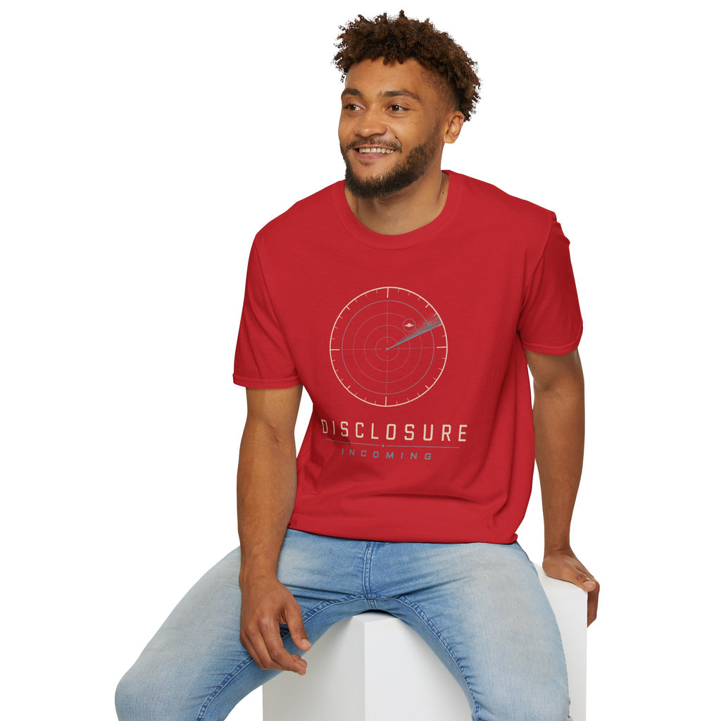 Man wearing red UFO disclosure t-shirt with a classic radar screen showing a flying saucer tracked in the upper quadrant with a sweep trail and the words DISCLOSURE INCOMING in cream and cyan