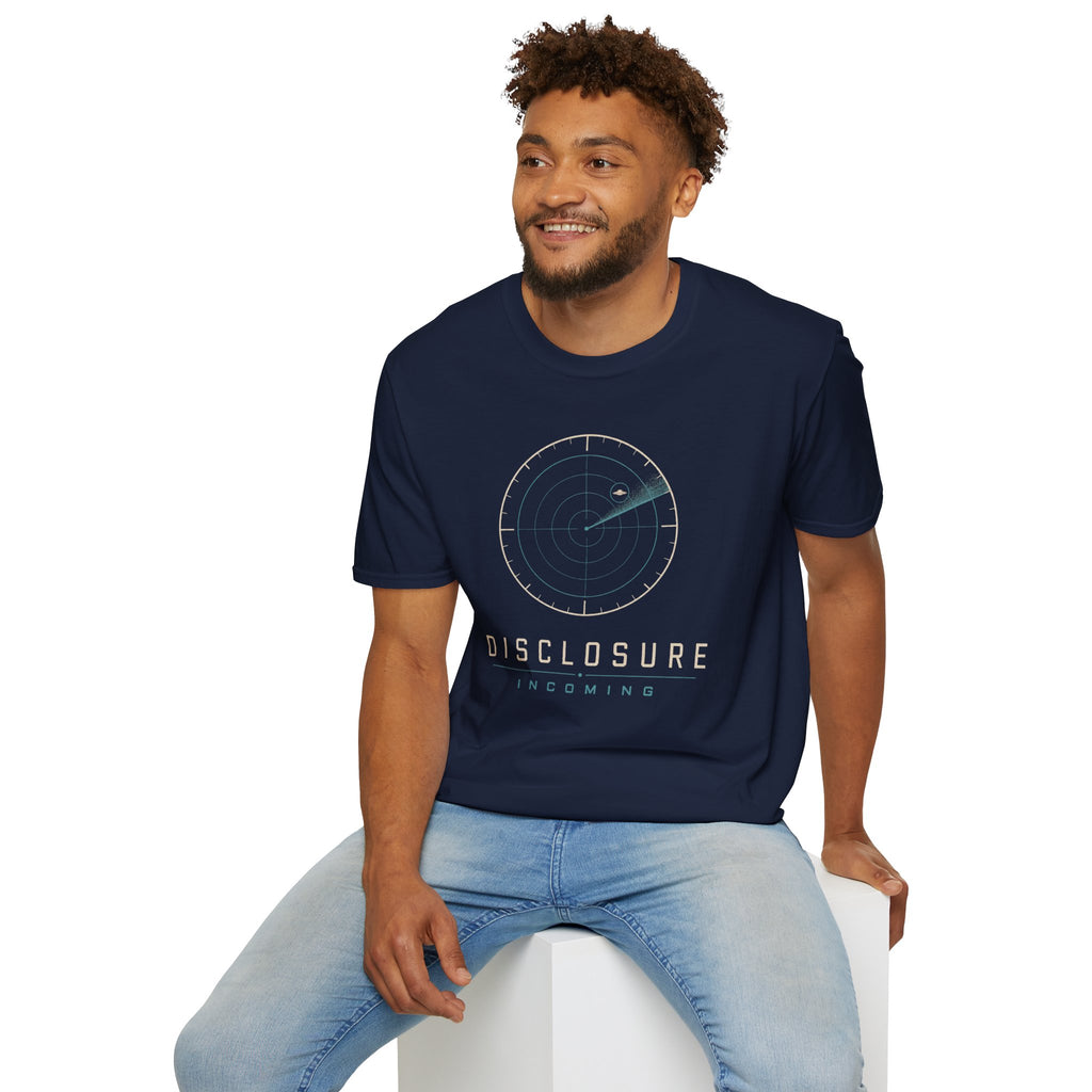 Man wearing navy blue UFO disclosure t-shirt with a classic radar screen showing a flying saucer tracked in the upper quadrant with a sweep trail and the words DISCLOSURE INCOMING in cream and cyan