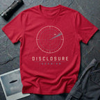 Red UFO disclosure t-shirt with a classic radar screen showing a flying saucer tracked in the upper quadrant with a sweep trail and the words DISCLOSURE INCOMING in cream and cyan