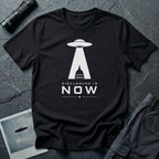 Black UFO disclosure t-shirt with a flying saucer beaming the US Capitol building in white with the words DISCLOSURE IS NOW
