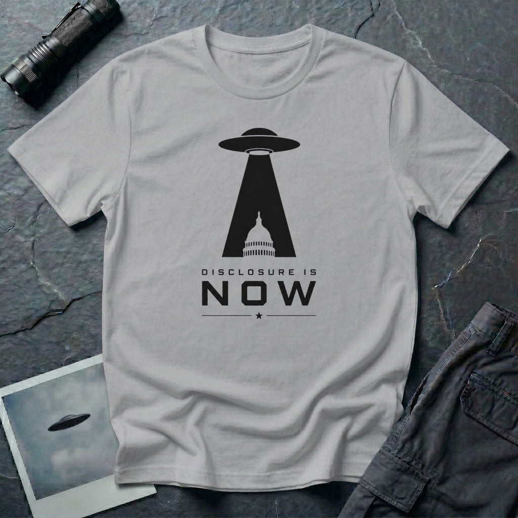 White UFO disclosure t-shirt with a flying saucer beaming the US Capitol building in black with the words DISCLOSURE IS NOW
