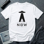 White UFO disclosure t-shirt with a flying saucer beaming the US Capitol building in black with the words DISCLOSURE IS NOW
