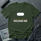 Green t-shirt with white Tic Tac UFO silhouette above an orange horizontal rule and DISCLOSURE NOW in bold white caps