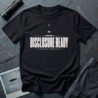 Black UFO disclosure t-shirt with bold block letters reading DISCLOSURE READY and subtitle CONTACT EXPECTED with a small flying saucer above the horizon in white