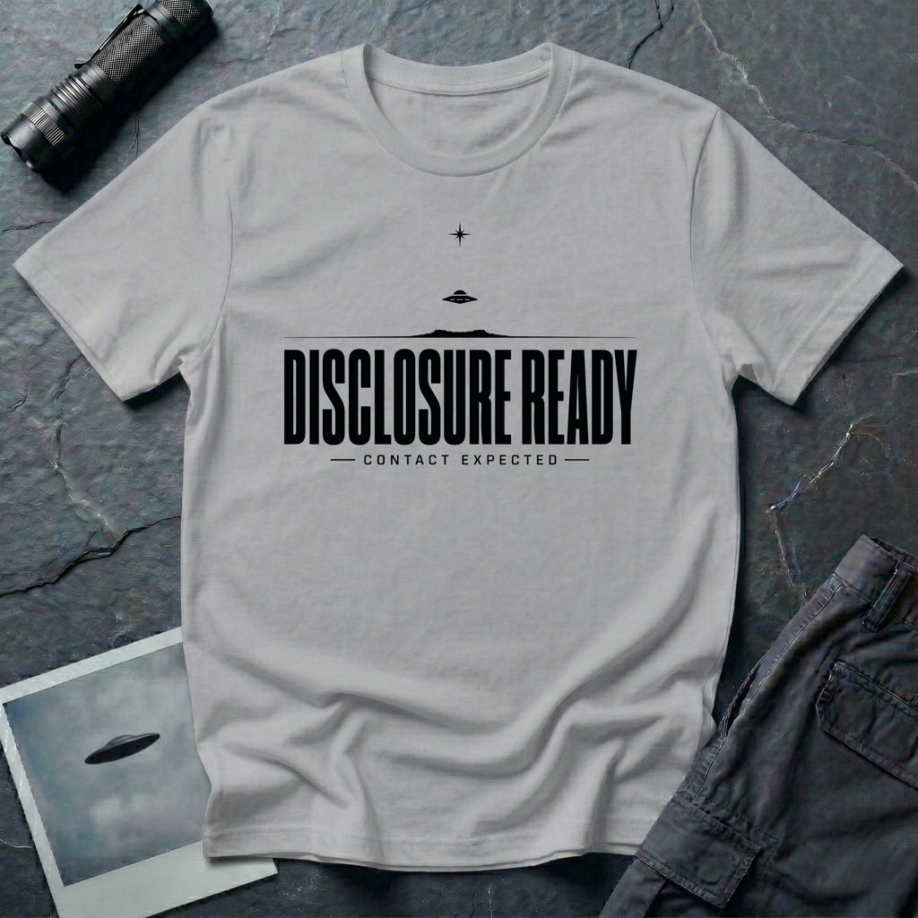 Grey UFO disclosure t-shirt with bold block letters reading DISCLOSURE READY and subtitle CONTACT EXPECTED with a small flying saucer above the horizon in black