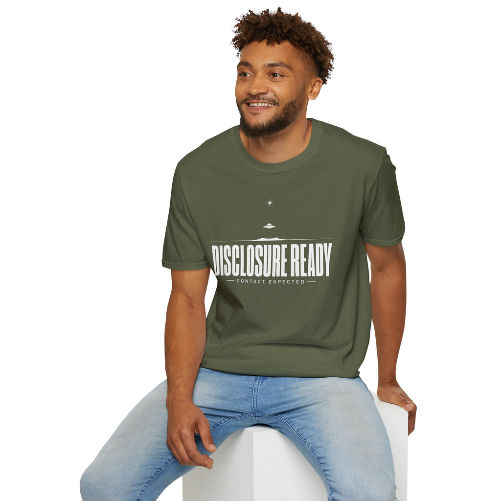 Man wearing green UFO disclosure t-shirt with bold block letters reading DISCLOSURE READY and subtitle CONTACT EXPECTED with a small flying saucer above the horizon in white