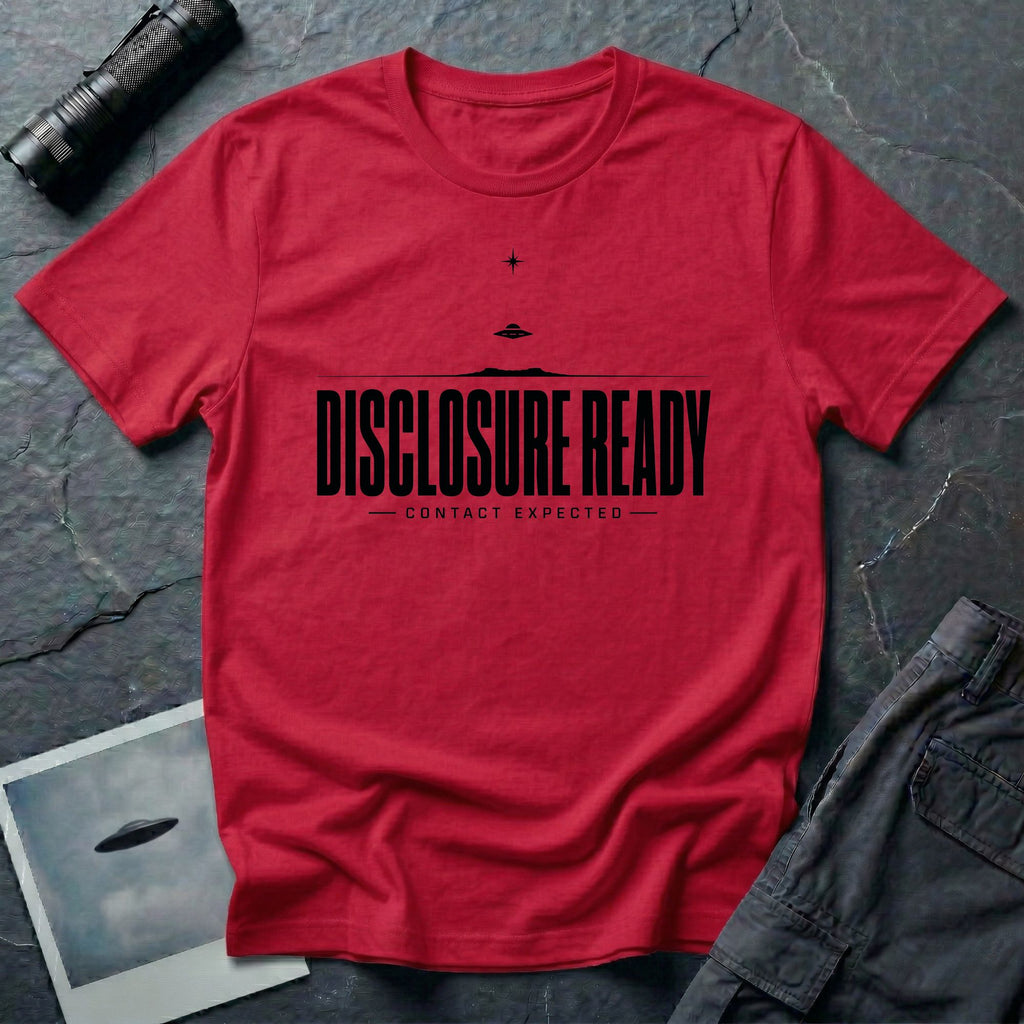 Red UFO disclosure t-shirt with bold block letters reading DISCLOSURE READY and subtitle CONTACT EXPECTED with a small flying saucer above the horizon in black