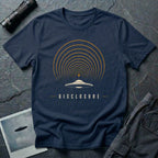 Navy blue UFO disclosure t-shirt with a flying saucer broadcasting concentric signal arcs upward in orange and cream with the word DISCLOSURE beneath