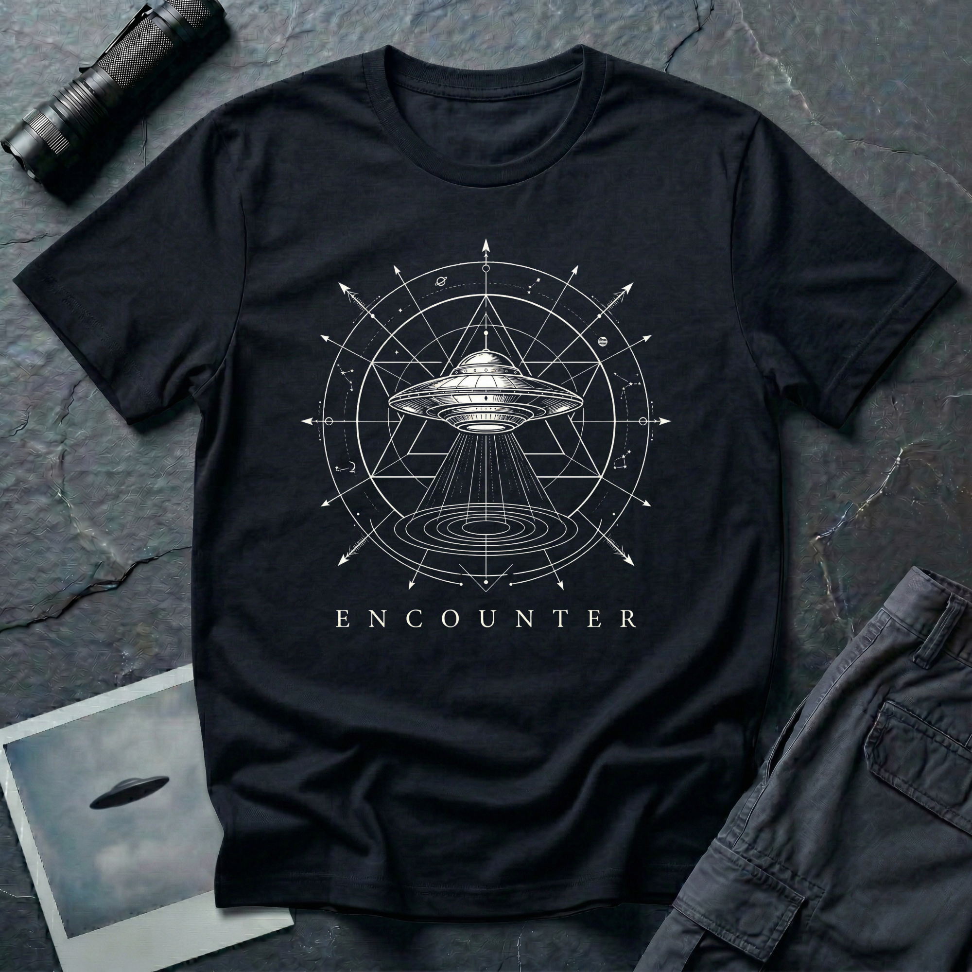 Encounter zodiac UFO t-shirt — flying saucer inside zodiac star chart and cosmological diagram in white on black cotton tee