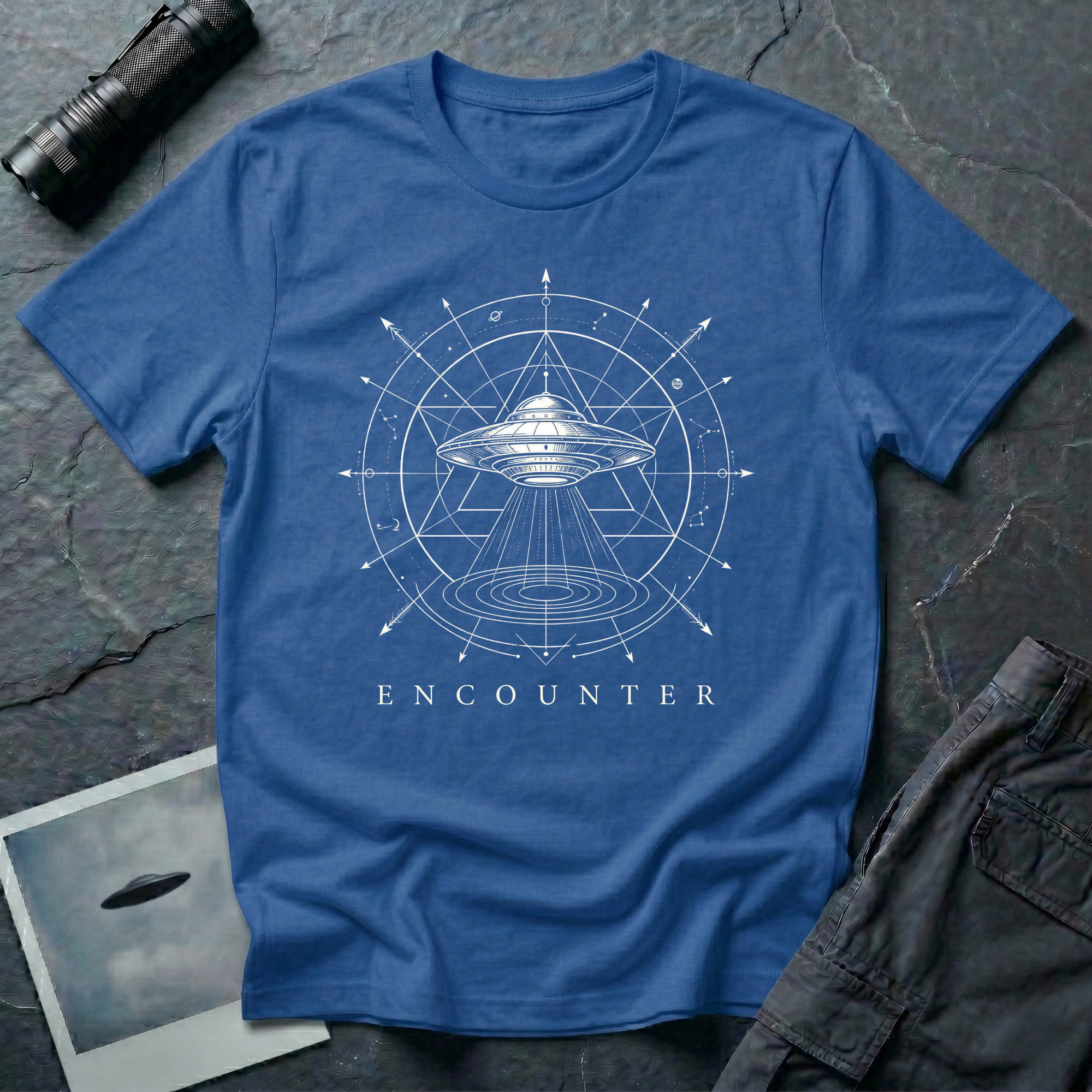Encounter zodiac UFO t-shirt — flying saucer inside zodiac star chart and cosmological diagram in white on blue cotton tee