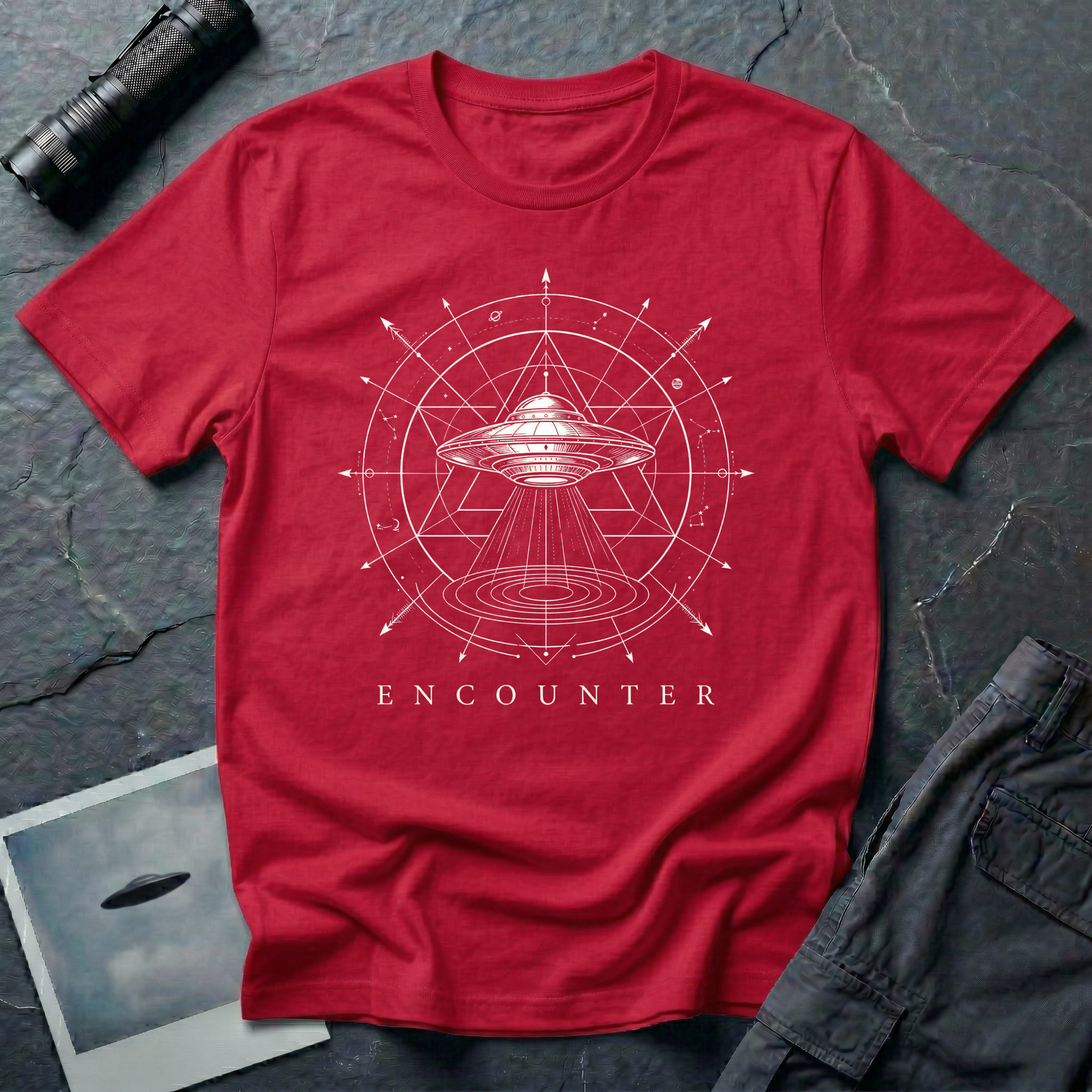 Encounter zodiac UFO t-shirt — flying saucer inside zodiac star chart and cosmological diagram in white on red cotton tee