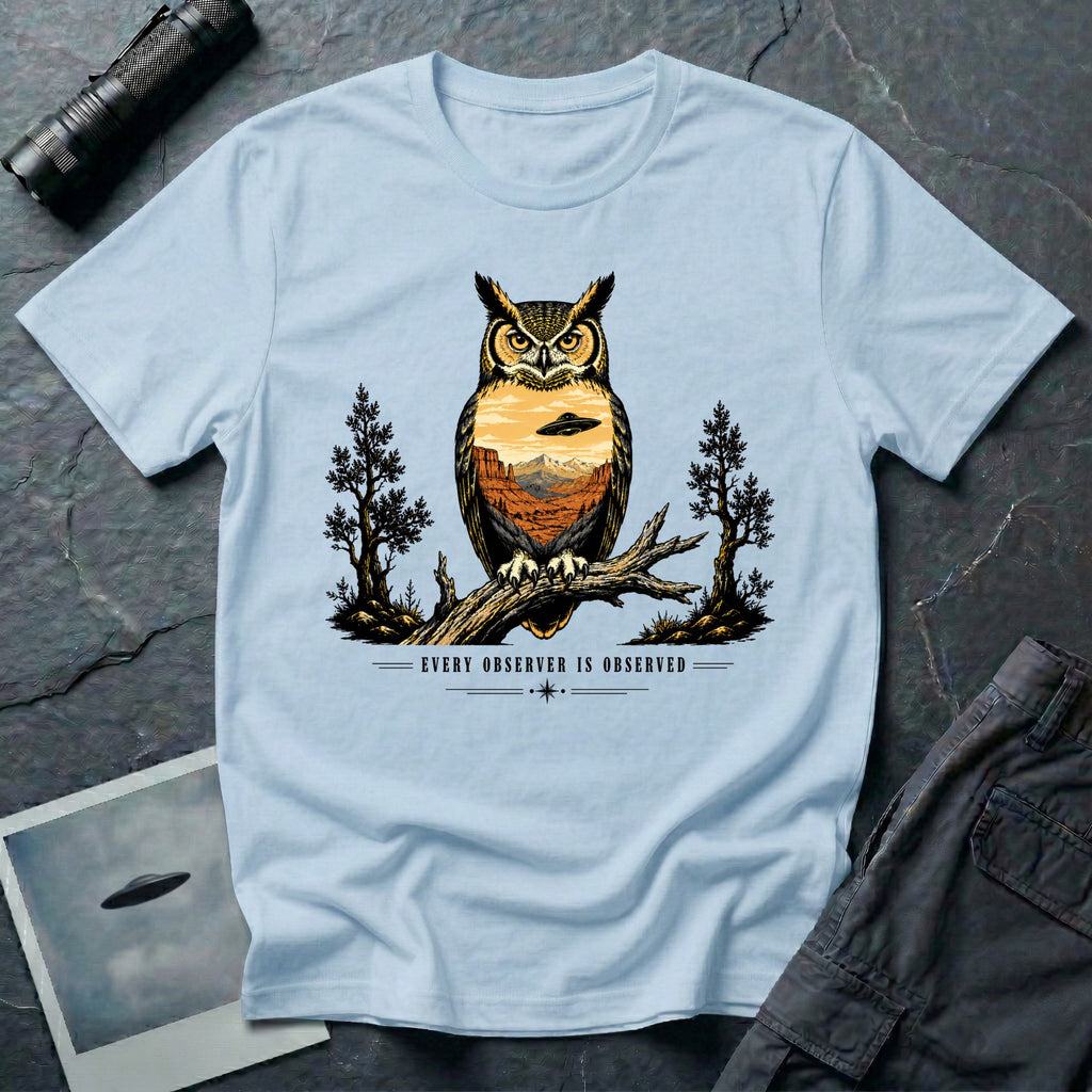 Every Observer Is Observed UFO t-shirt with owl double exposure and single tilted saucer in desert skyline, light blue
