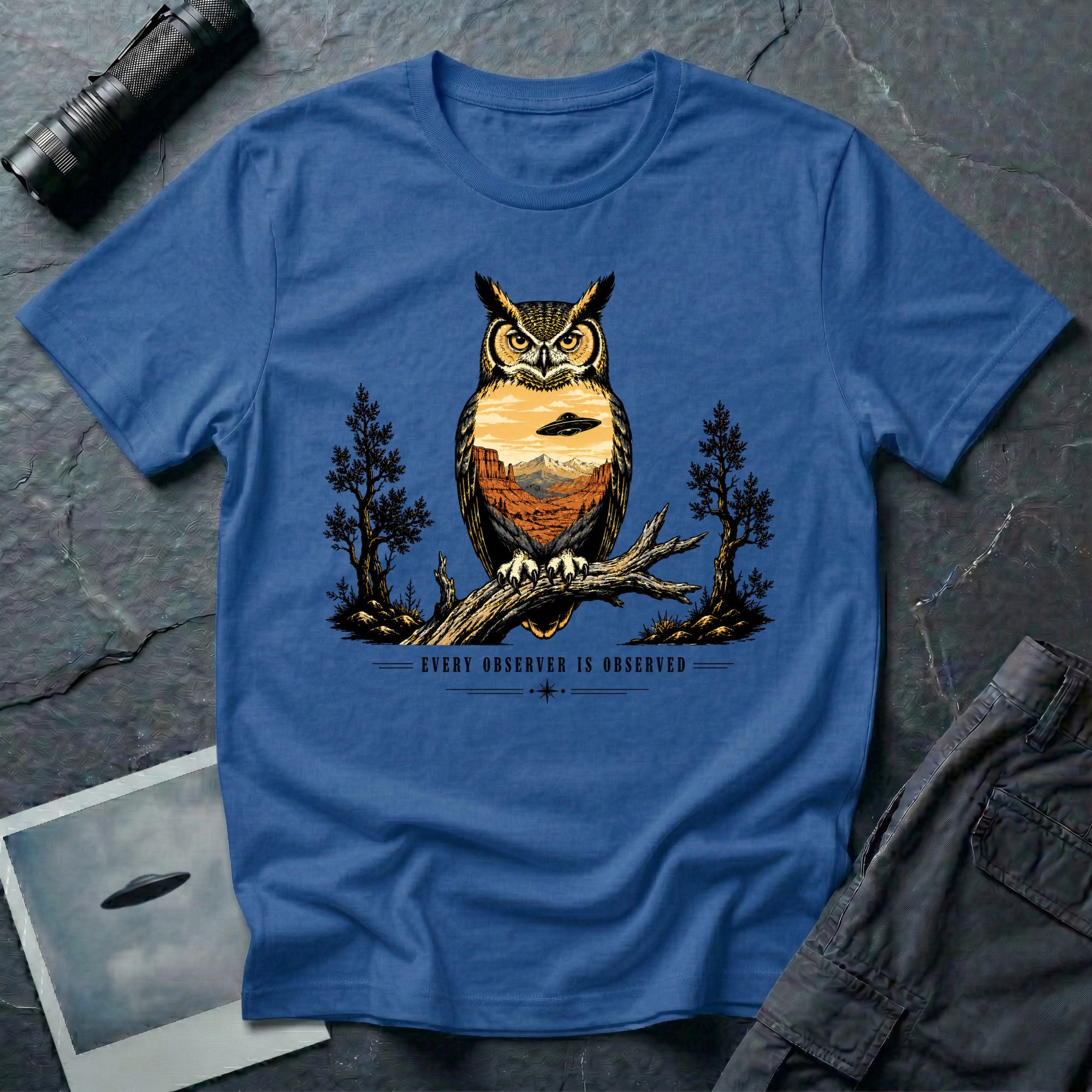 Every Observer Is Observed UFO t-shirt with owl double exposure and single tilted saucer in desert skyline, blue