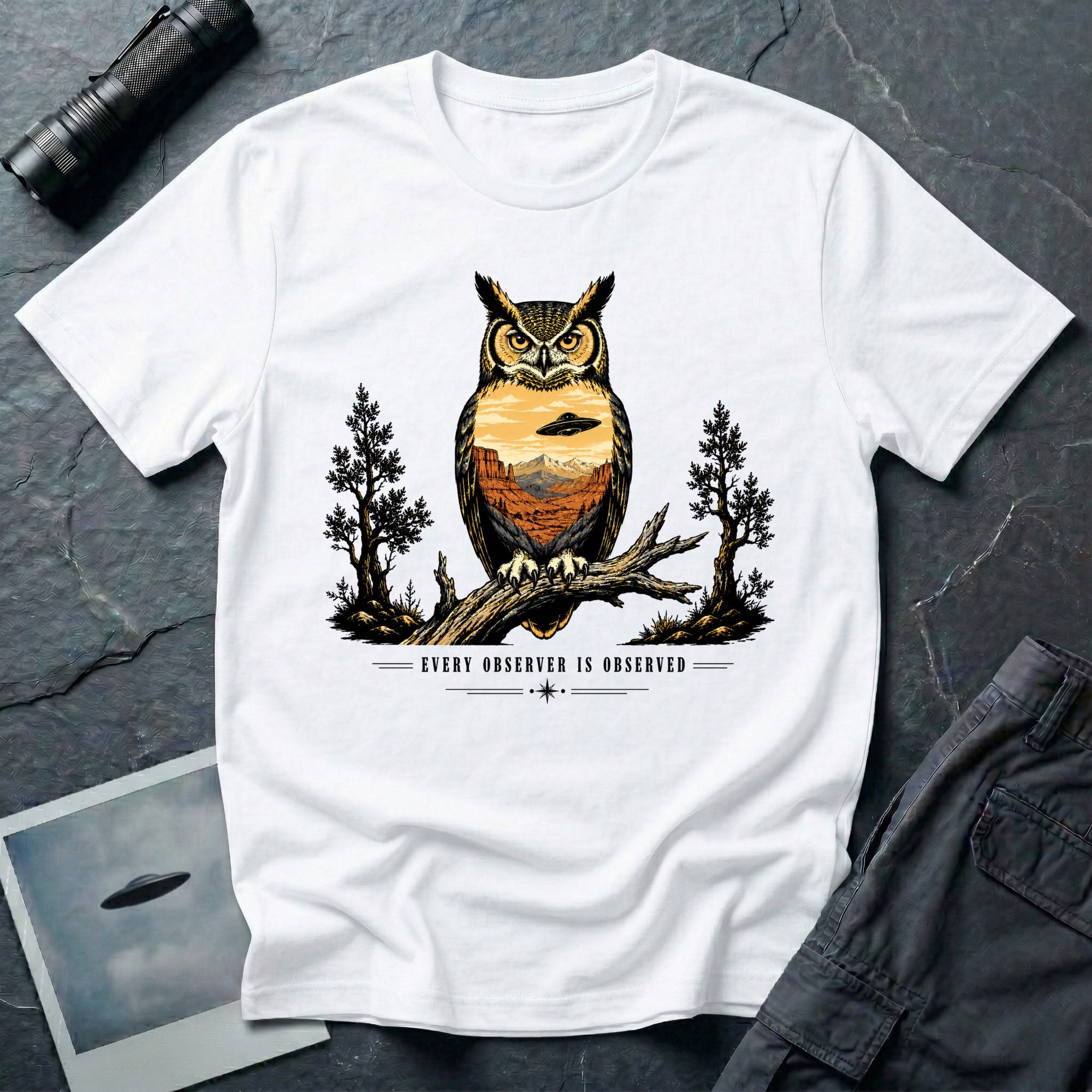 Every Observer Is Observed UFO t-shirt with owl double exposure and single tilted saucer in desert skyline, white