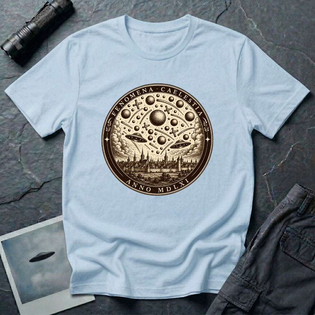 Light blue t-shirt with a sepia engraving medallion depicting the 1561 Nuremberg UFO phenomenon with craft, spheres and the words FENOMENA CAELESTIA ANNO MDLXI