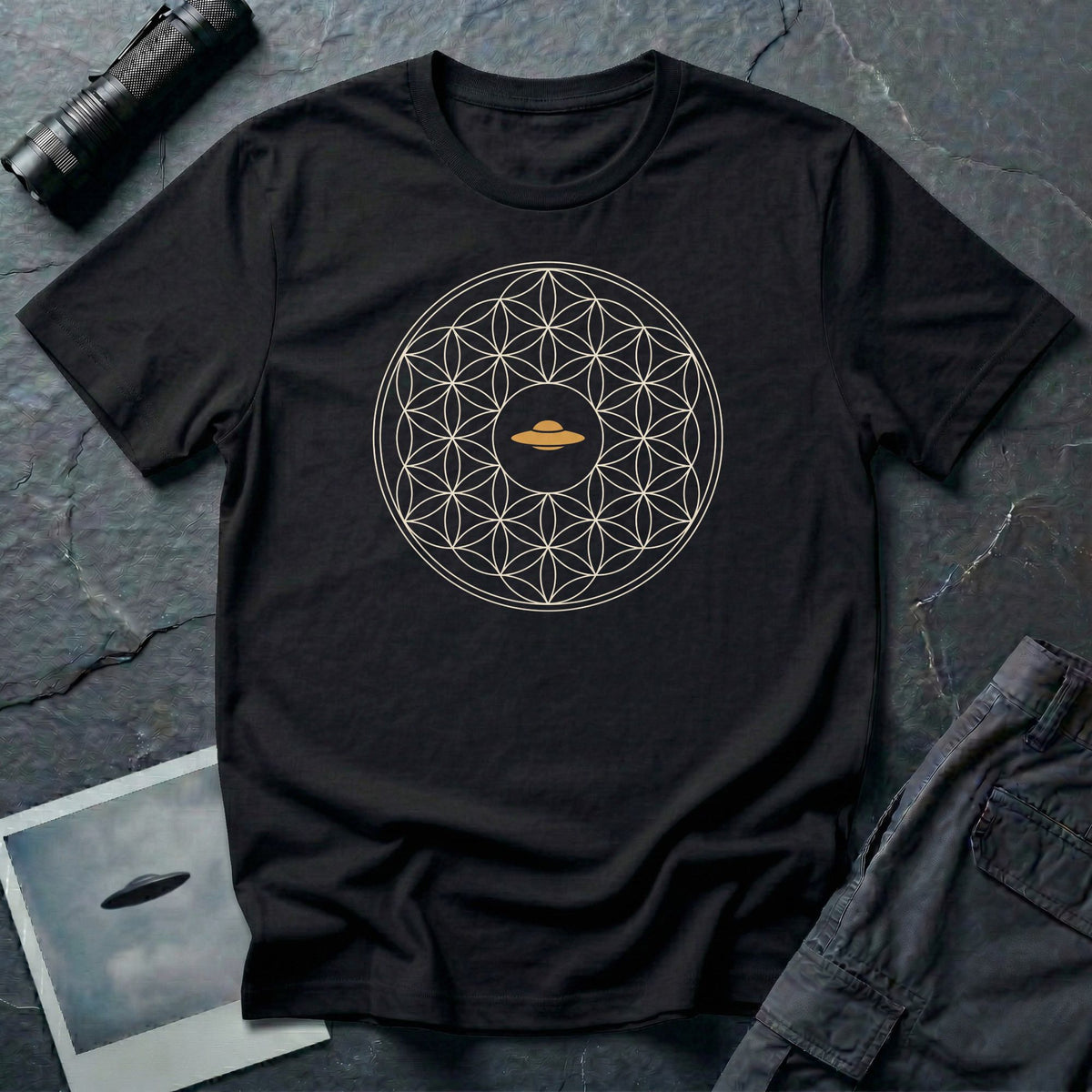 Black t-shirt with cream Flower of Life sacred geometry pattern and gold UFO at the centre