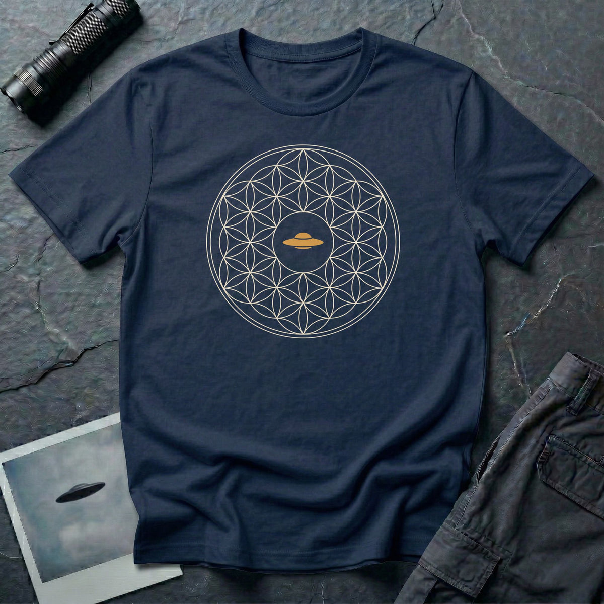 Navy blue t-shirt with cream Flower of Life sacred geometry pattern and gold UFO at the centre