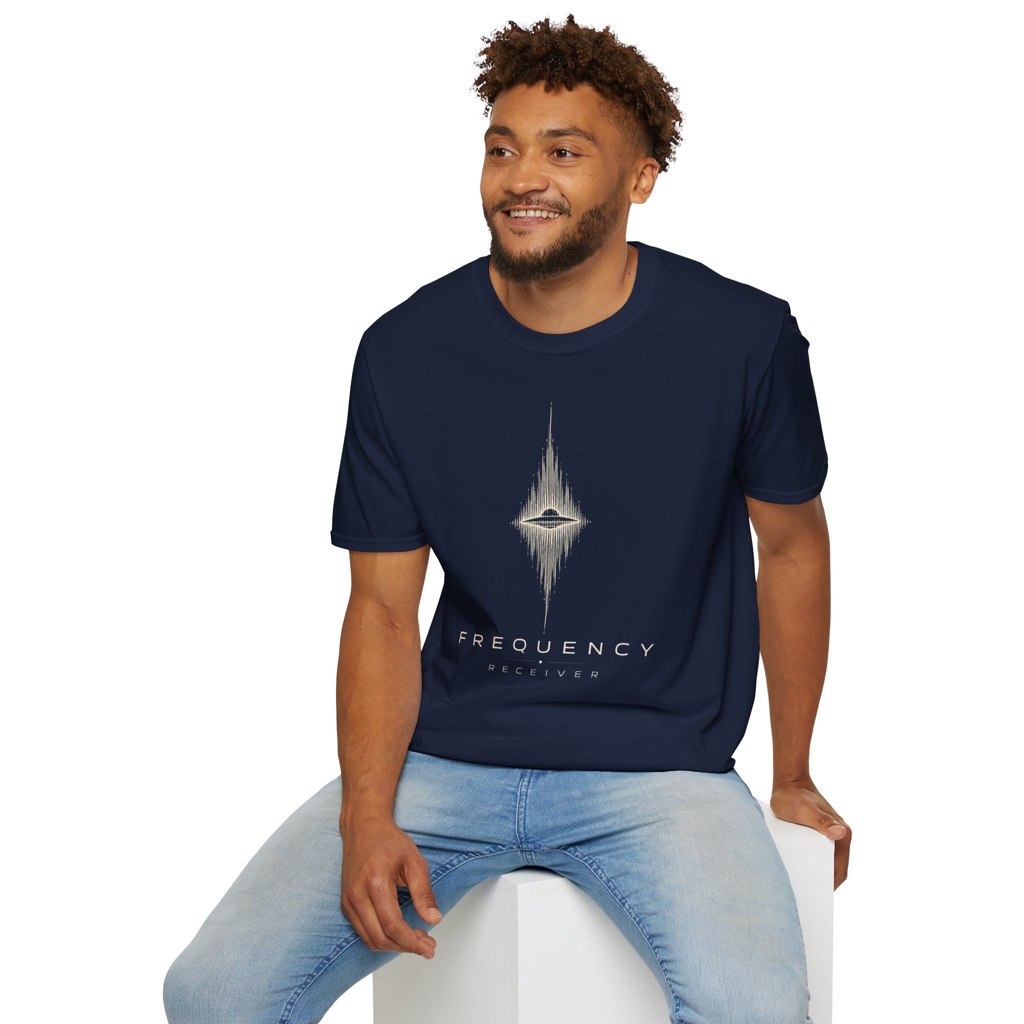 Man wearing navy blue UFO t-shirt with a flying saucer at the centre of a diamond-shaped frequency waveform in cream with the words FREQUENCY RECEIVER beneath