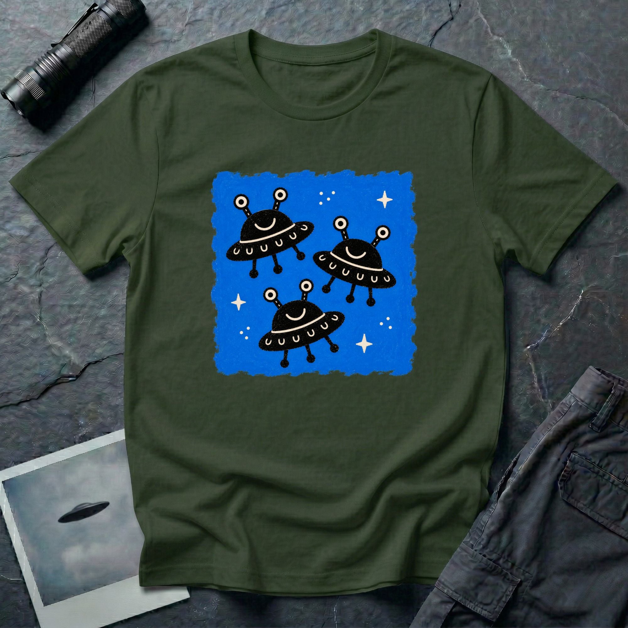 Little Visitors The Fleet UFO t-shirt with three smiling black saucers in formation on blue