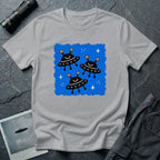 Little Visitors The Fleet UFO t-shirt with three smiling black saucers in formation on blue