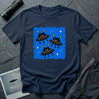 Little Visitors The Fleet UFO t-shirt with three smiling black saucers in formation on blue