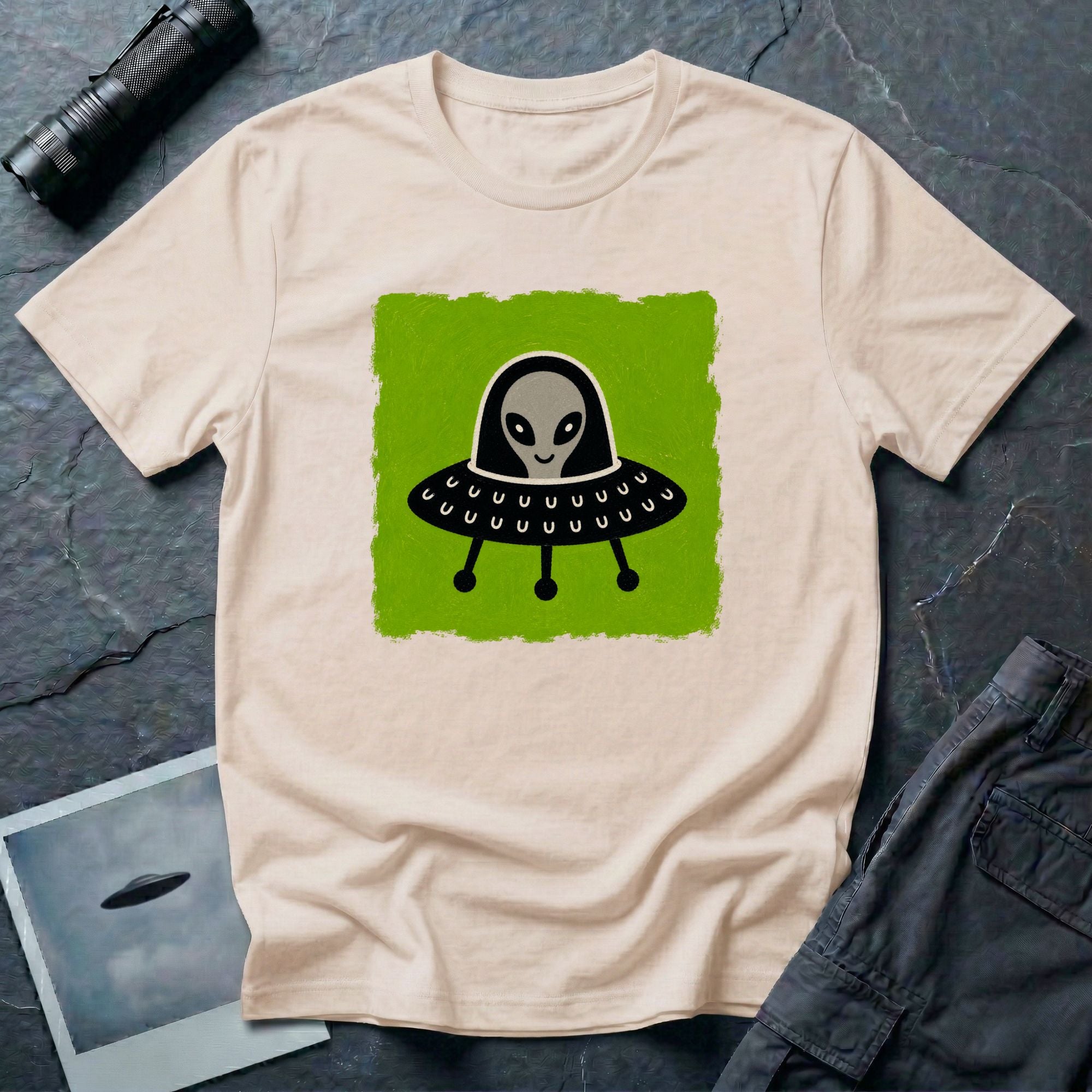 Little Visitors The Pilot UFO t-shirt with friendly grey alien in black saucer on green