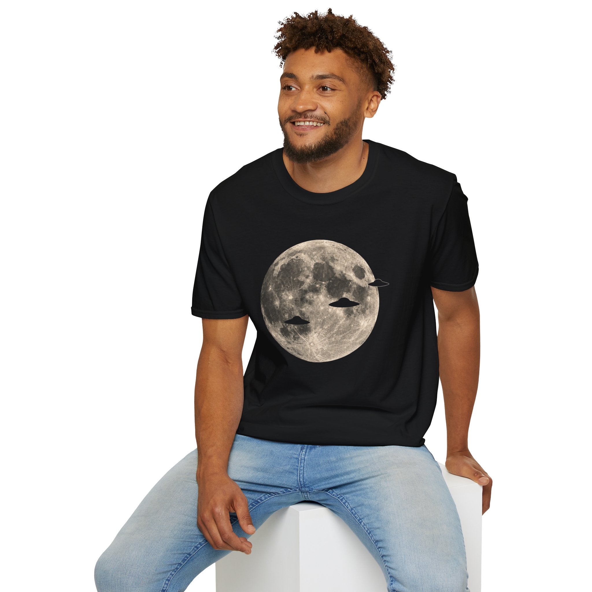 Black UFO t-shirt with three disc silhouettes crossing a full moon photograph being worn by a man