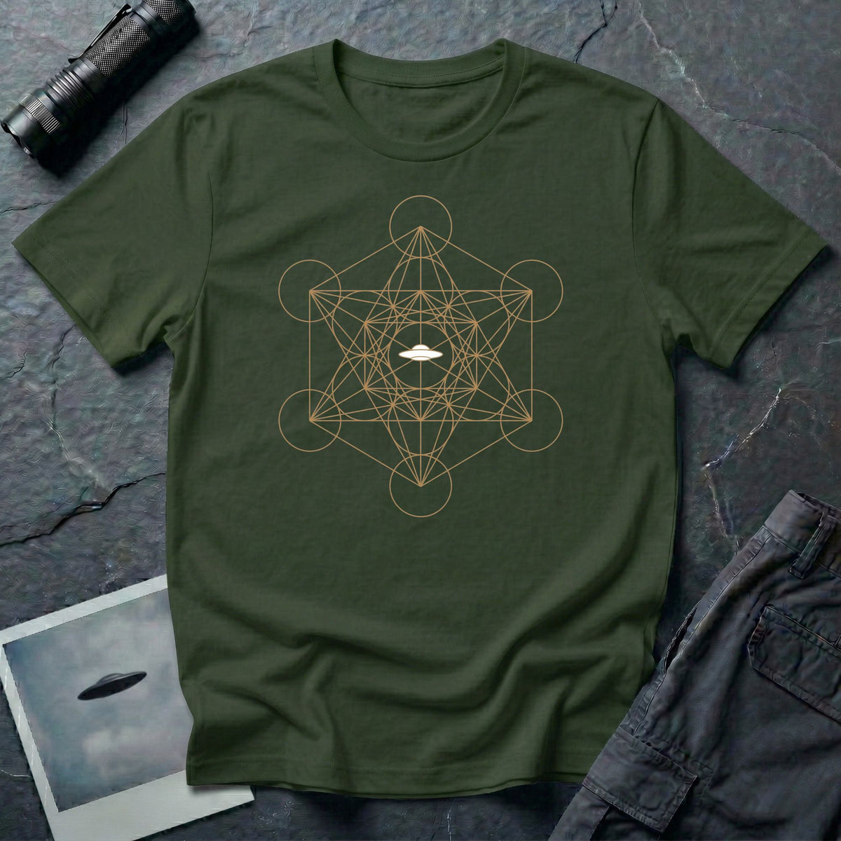 Military green t-shirt with gold Metatron's Cube sacred geometry design and white UFO silhouette at the centre