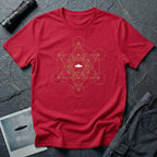 Red t-shirt with gold Metatron's Cube sacred geometry design and white UFO silhouette at the centre