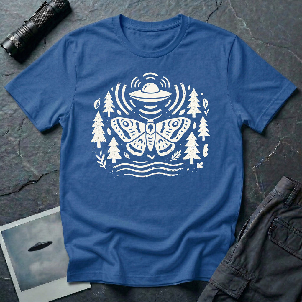Moth and UFO T-shirt with a folk-art moth beneath a flying saucer, surrounded by pine trees, leaves and radiating signal lines, on royal blue t-shirt