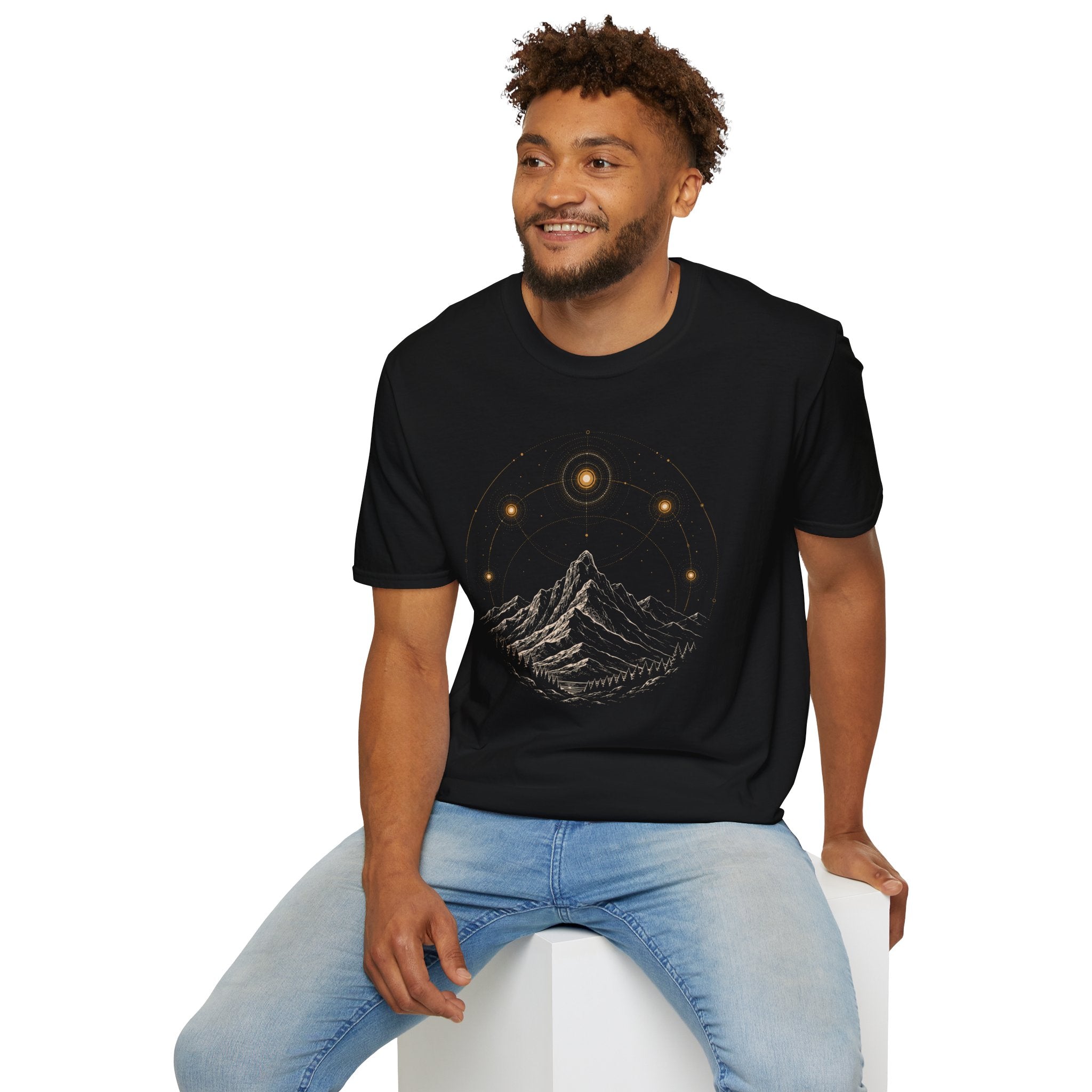 Man wearing black UFO t-shirt with orb sightings and sacred geometry over mountain range design