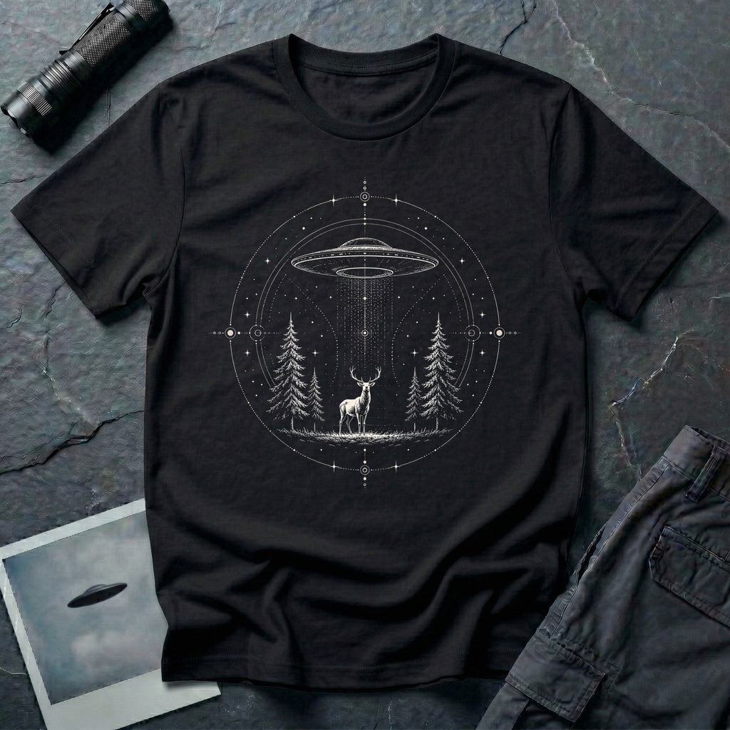 Mystical Stag UFO black T-Shirt featuring a stag under a hovering saucer in a pine forest with stars and sacred geometric details