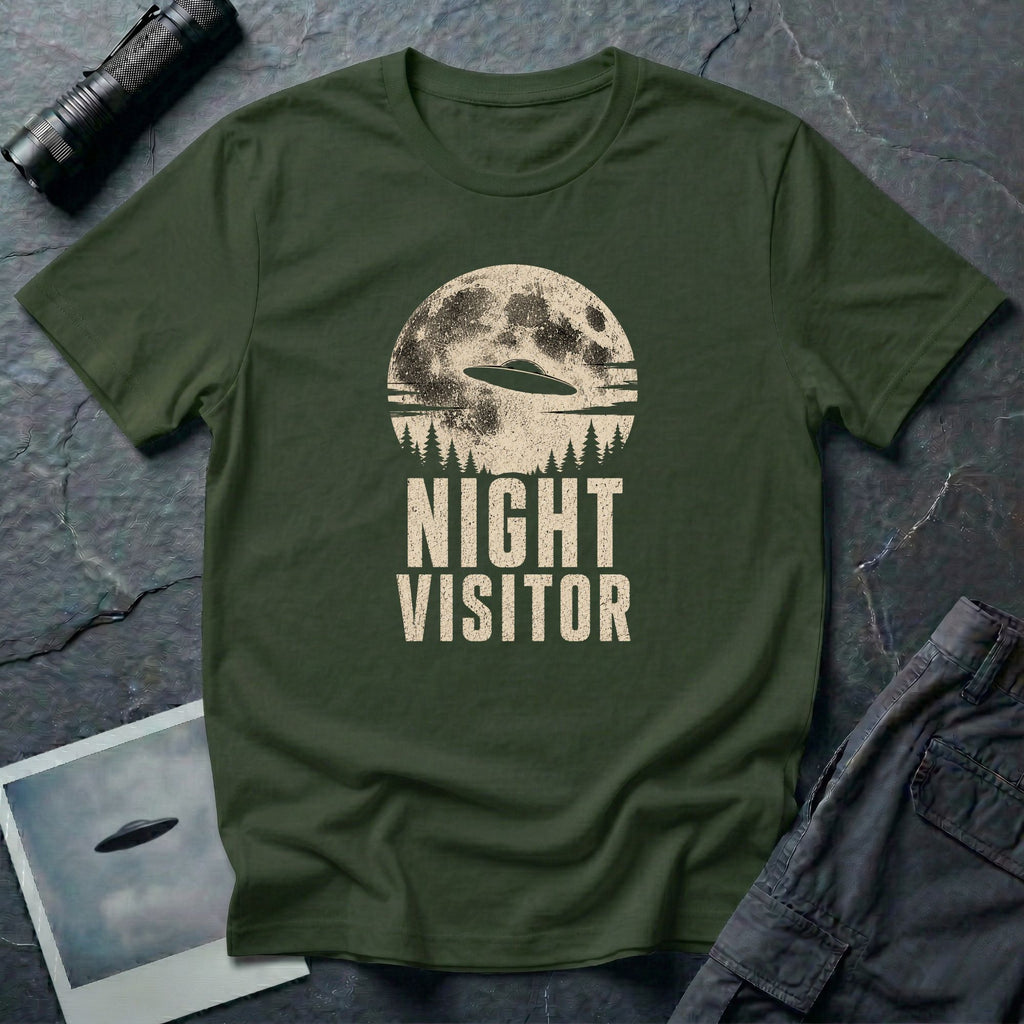 Military green retro UFO t-shirt with a flying saucer crossing a full moon over a conifer treeline with the words NIGHT VISITOR in distressed pale lettering