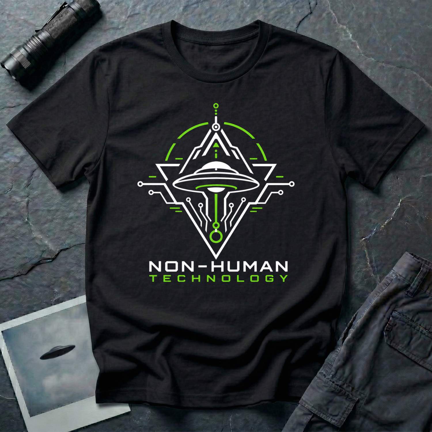 Black t-shirt with geometric diamond frame circuit board UAP UFO schematic design in white and green with NON-HUMAN TECHNOLOGY text