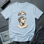 Classical marble bust with the top of the head lifted to reveal a UFO emerging, in cream engraving linework on a light blue t-shirt