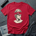 Classical marble bust with the top of the head lifted to reveal a UFO emerging, in cream engraving linework on a red t-shirt