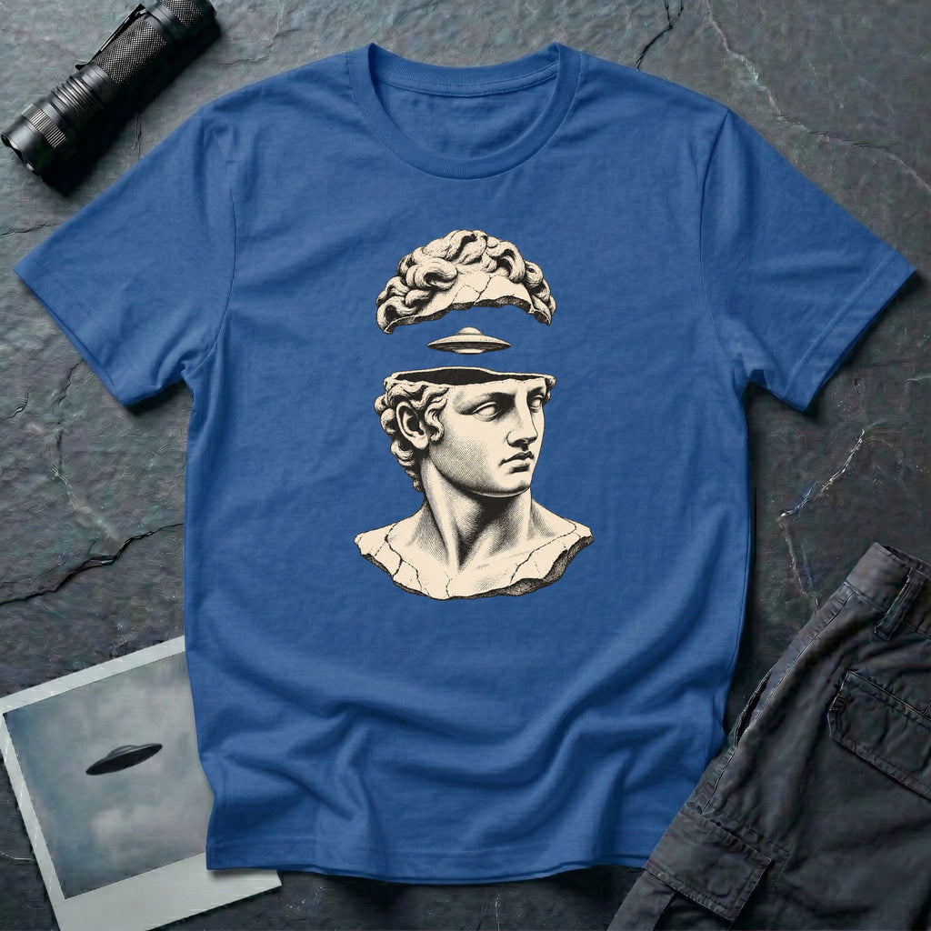 Classical marble bust with the top of the head lifted to reveal a UFO emerging, in cream engraving linework on a royal blue t-shirt
