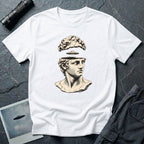 Classical marble bust with the top of the head lifted to reveal a UFO emerging, in cream engraving linework on a white t-shirt