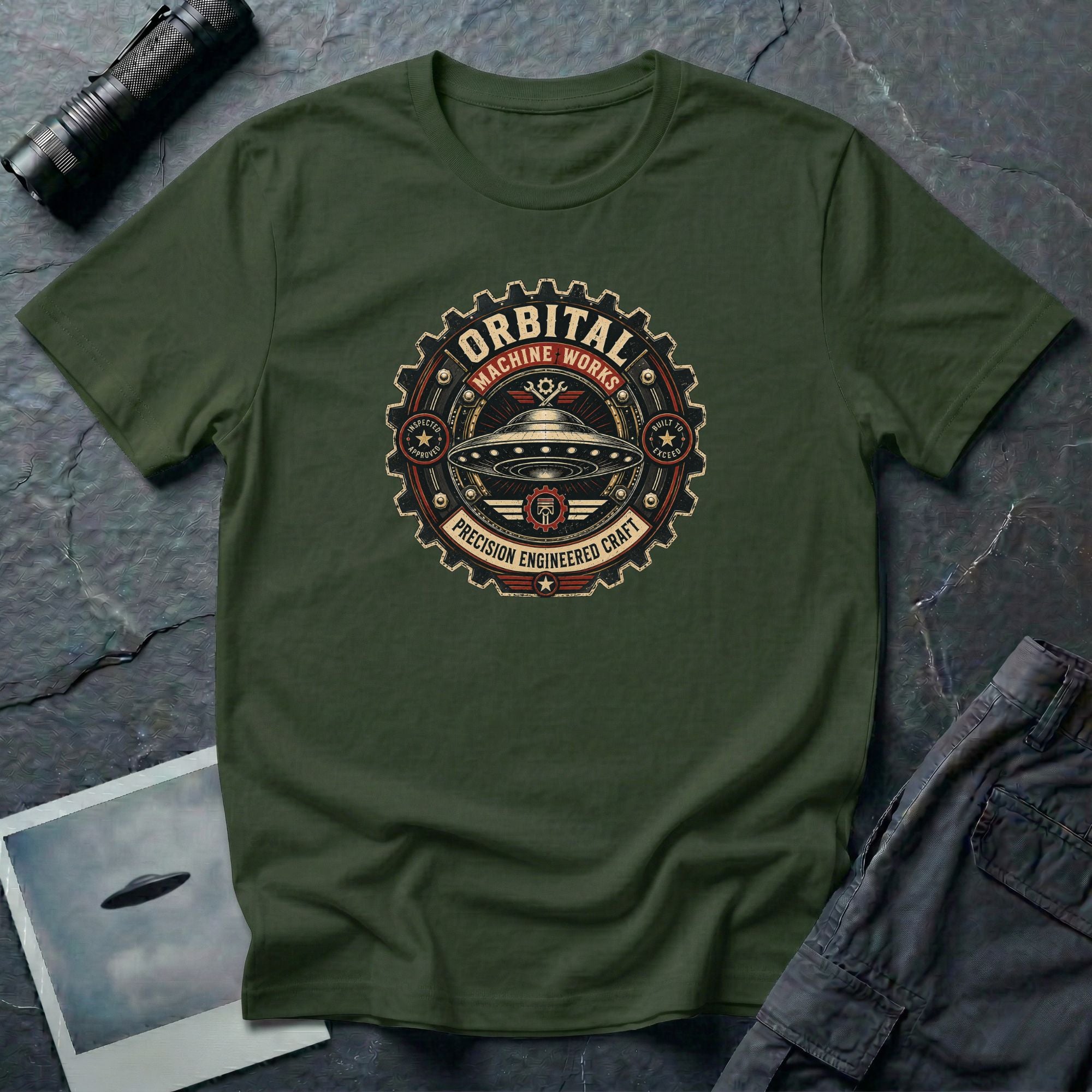 Orbital Machine Works UFO patch t-shirt with riveted saucer in vintage gear wheel emblem, military green