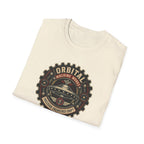 Orbital Machine Works UFO patch t-shirt with riveted saucer in vintage gear wheel emblem, folded, natural