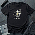 Orbs UFO t-shirt, seven ring-and-dot circles in a rosette pattern with one solid gold orb, above bold ORBS text, black