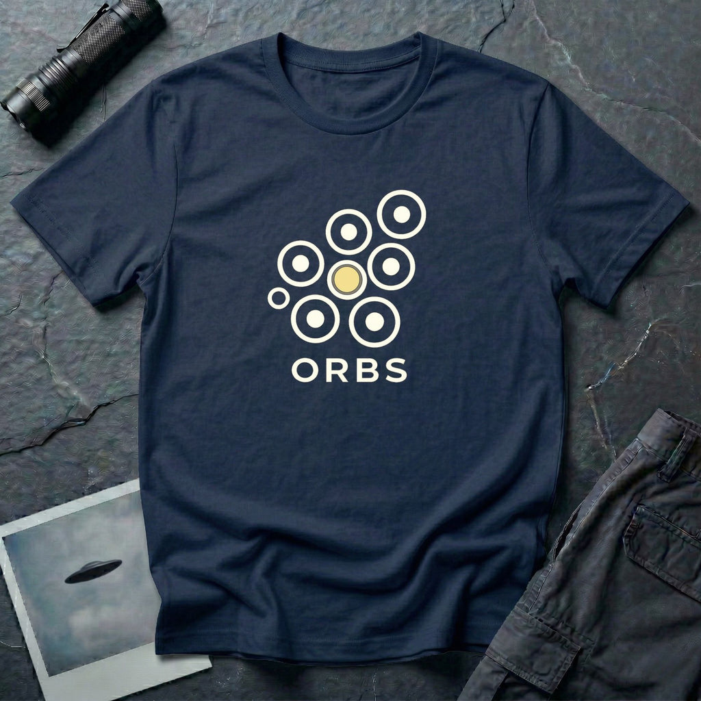 Orbs UFO t-shirt, seven ring-and-dot circles in a rosette pattern with one solid gold orb, above bold ORBS text, navy blue