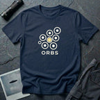 Orbs UFO t-shirt, seven ring-and-dot circles in a rosette pattern with one solid gold orb, above bold ORBS text, navy blue