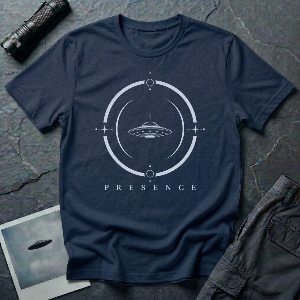 Navy blue UFO t-shirt with a flying saucer inside a broken circular frame with the word PRESENCE beneath