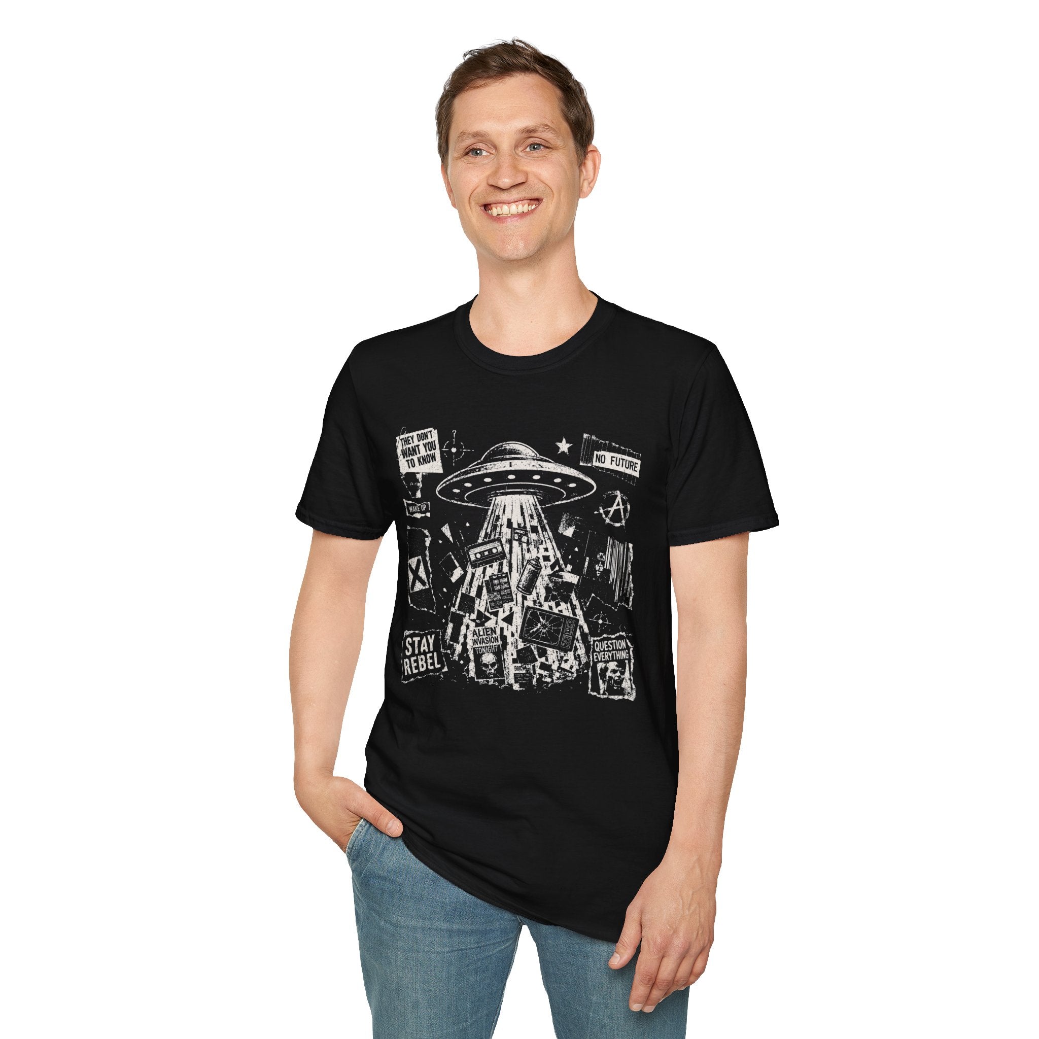Man in punk fanzine black UFO t-shirt with saucer tractor beam, anarchist symbols, and question everything slogans