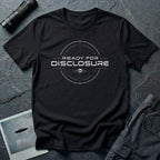 Black UFO disclosure t-shirt with a targeting reticle crosshair and the words READY FOR DISCLOSURE in white tech typography with a small flying saucer