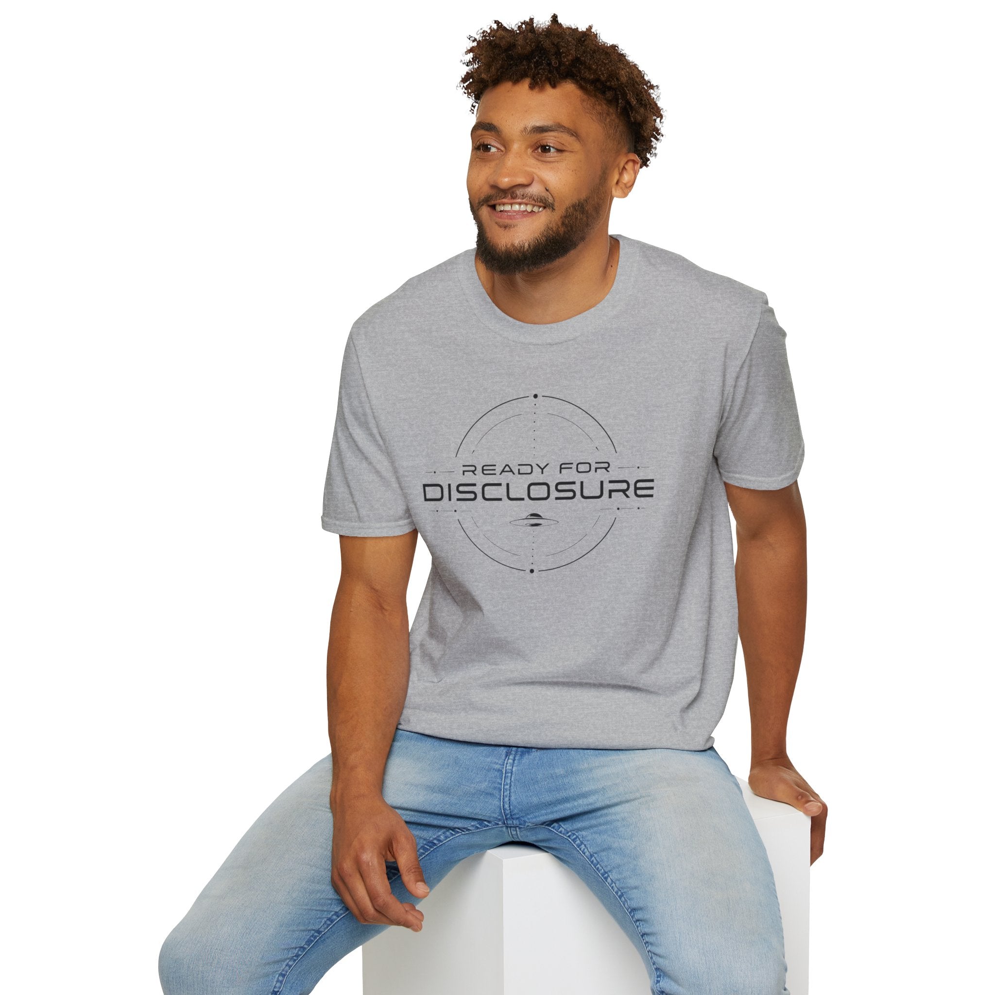 Man wearing grey UFO disclosure t-shirt with a targeting reticle crosshair and the words READY FOR DISCLOSURE in black tech typography with a small flying saucer