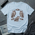 Silent Wings Owl UFO t-shirt with three engraved owls and three saucers in a circular design, light blue