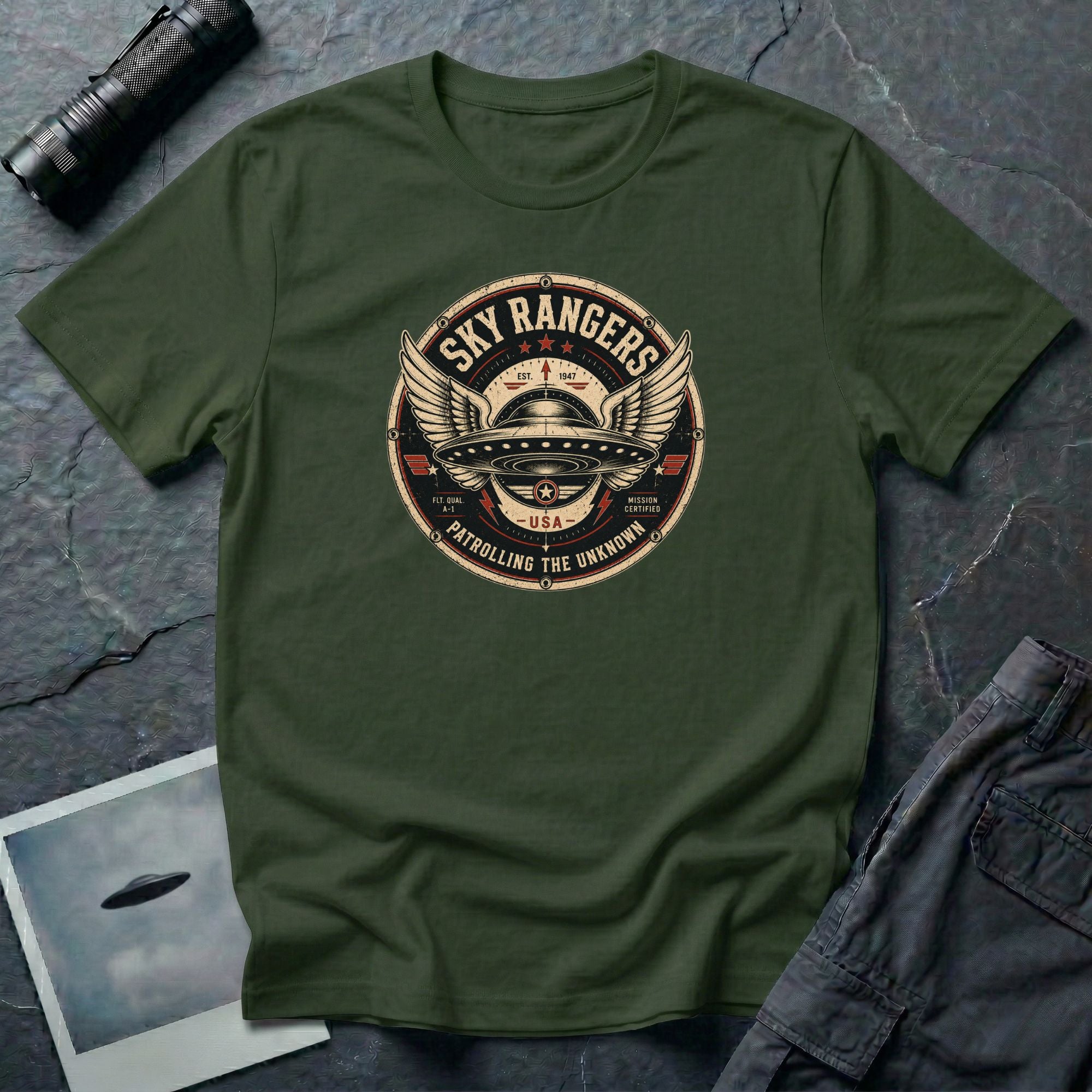 Sky Rangers UFO badge t-shirt with wings, saucer and vintage 1947 squadron patch design, military green.