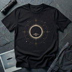 Black UFO t-shirt with saucer silhouette inside solar eclipse and orbital sacred geometry design
